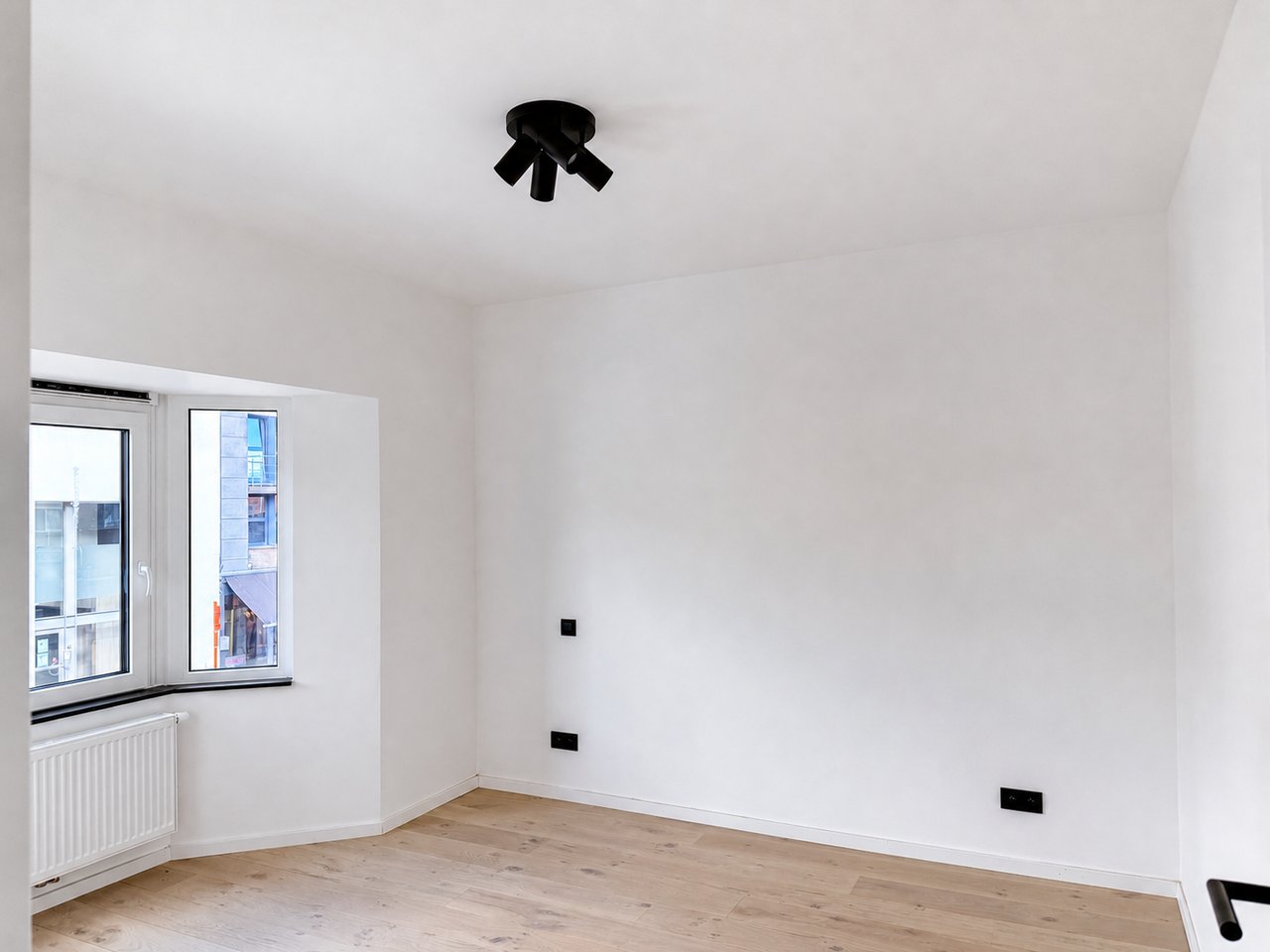 Slaapkamer in een totaal gerenoveerde woning in Burcht